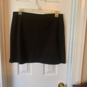 The limited black mini pencil skirt